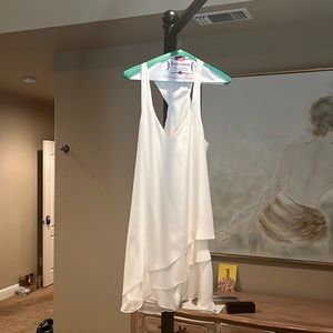Beautiful white dress perfect for a special occasion. In excellent condition.